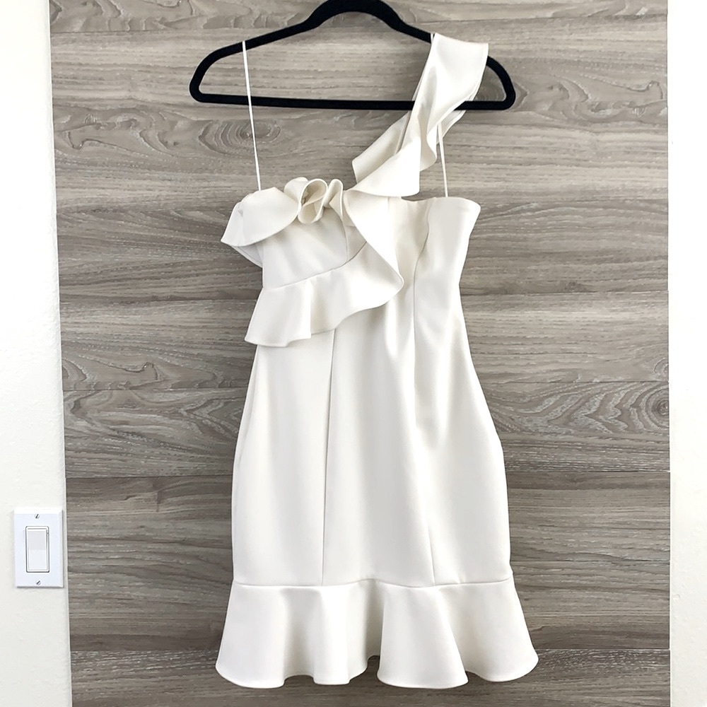 Likely white one shoulder off the shoulder ruffle tulip mini party dress